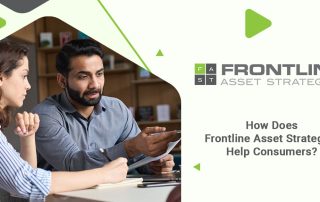 Professional executive helping new employee using laptop computer in office.